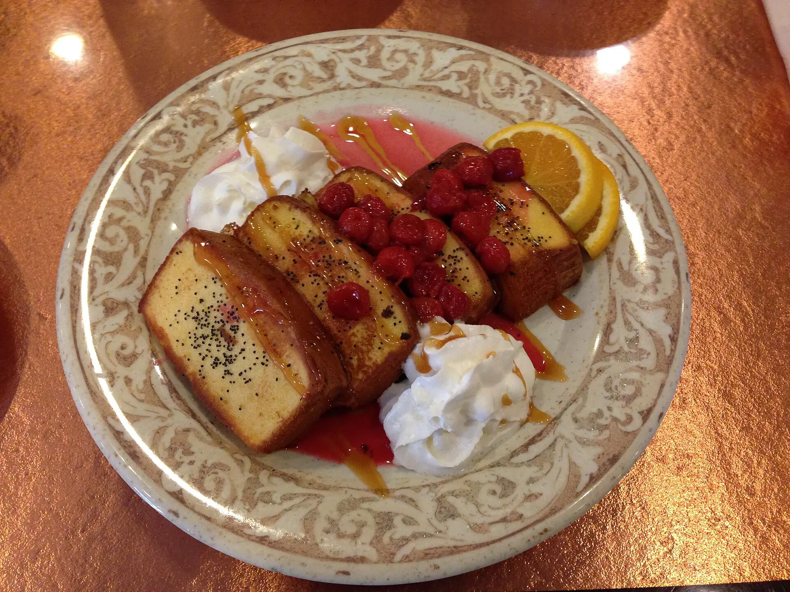 Poppy seed French toast with raspberries and whipped cream at Another Broken Egg Cafe on East Gregory Street in Pensacola.