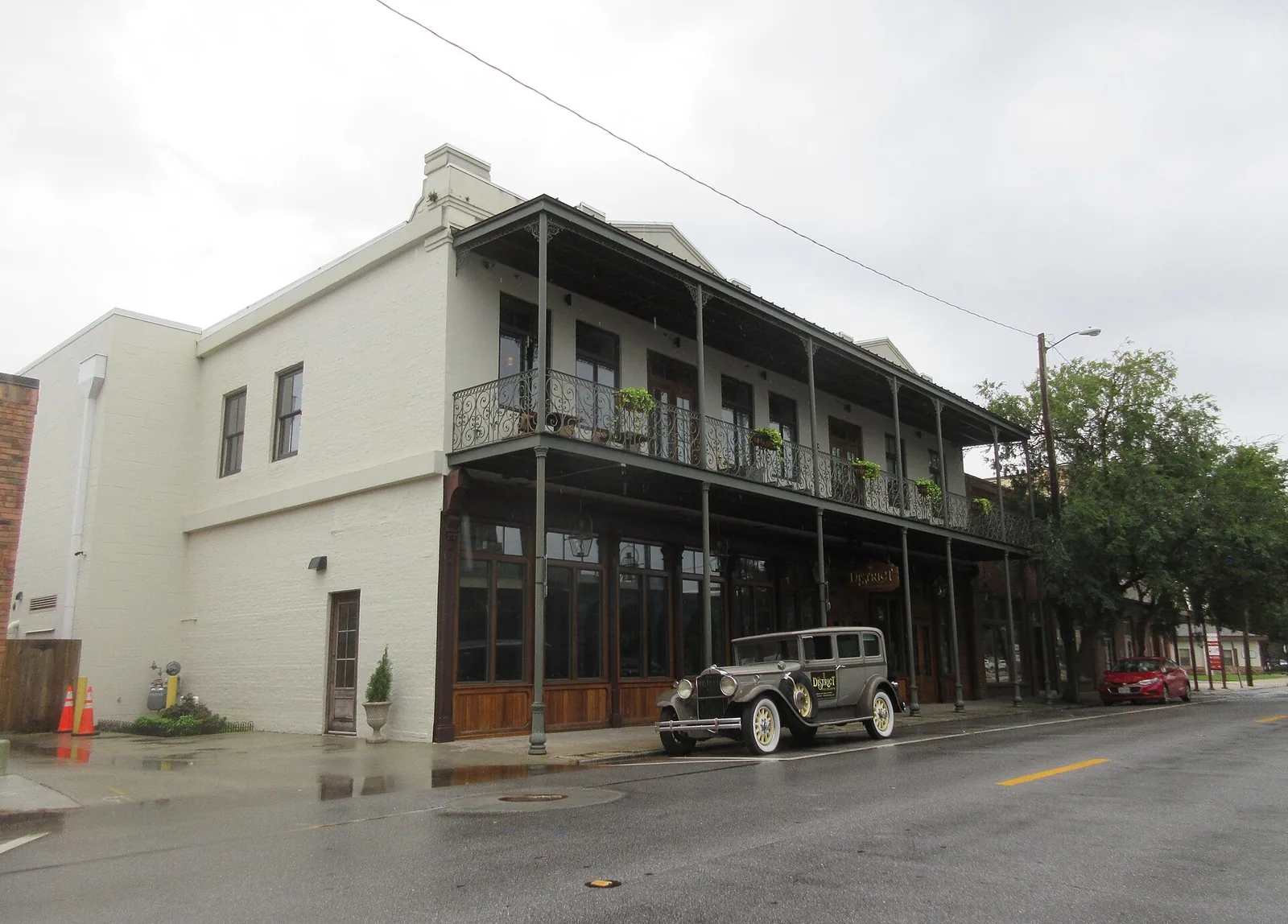 A two-story building with iron galleries on Government Street in downtown Pensacola.