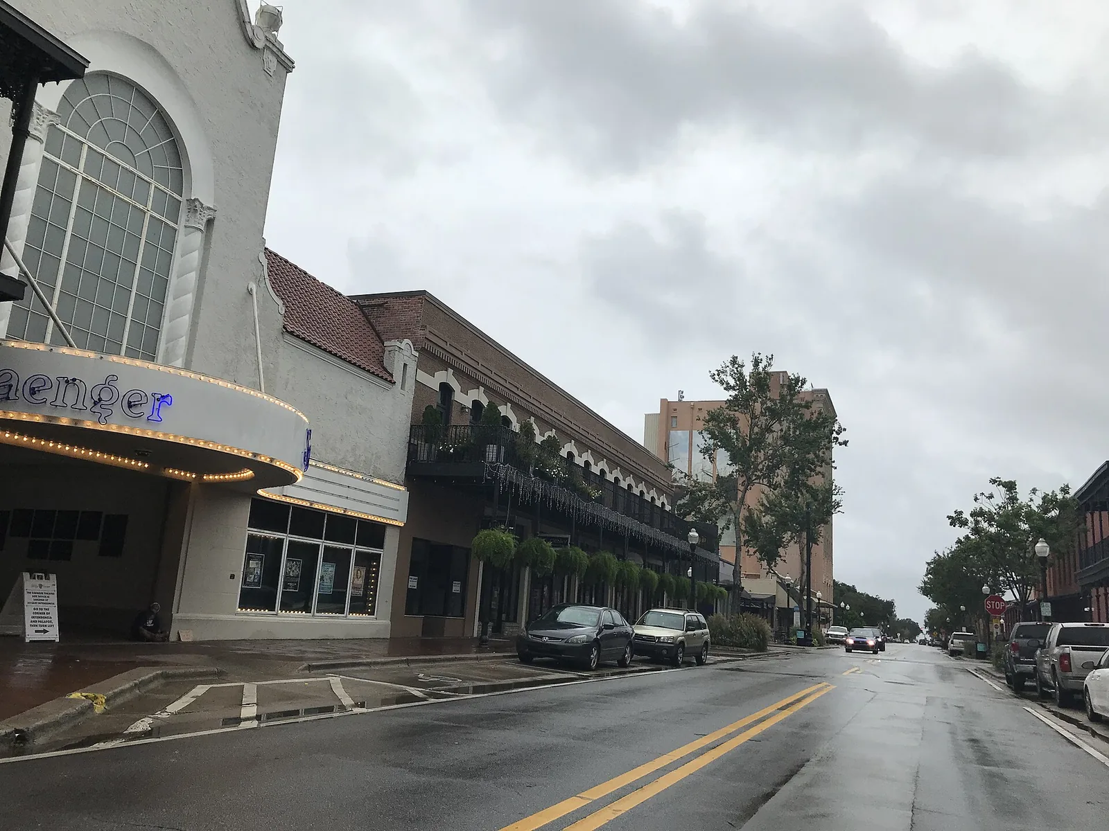 The Saenger Theatre marquee and the iron balconies of Palafox Street in downtown Pensacola.