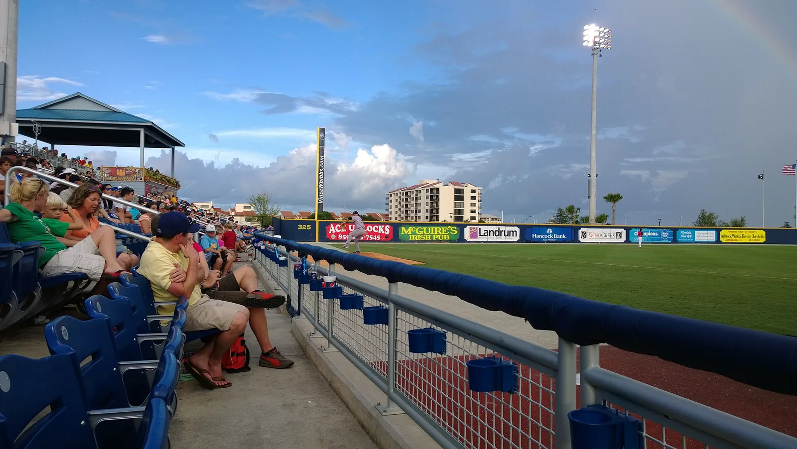 Fans in the stands along the first-base line at Blue Wahoos Stadium on the Pensacola waterfront.