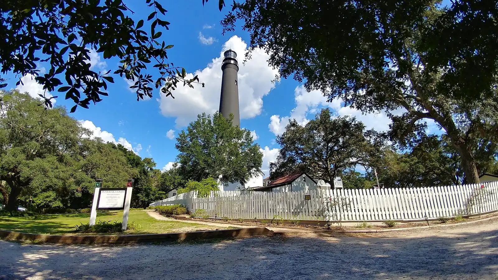 The Pensacola Lighthouse and its keeper's quarters on Naval Air Station Pensacola, where the museum holds after-hours ghost hunts.