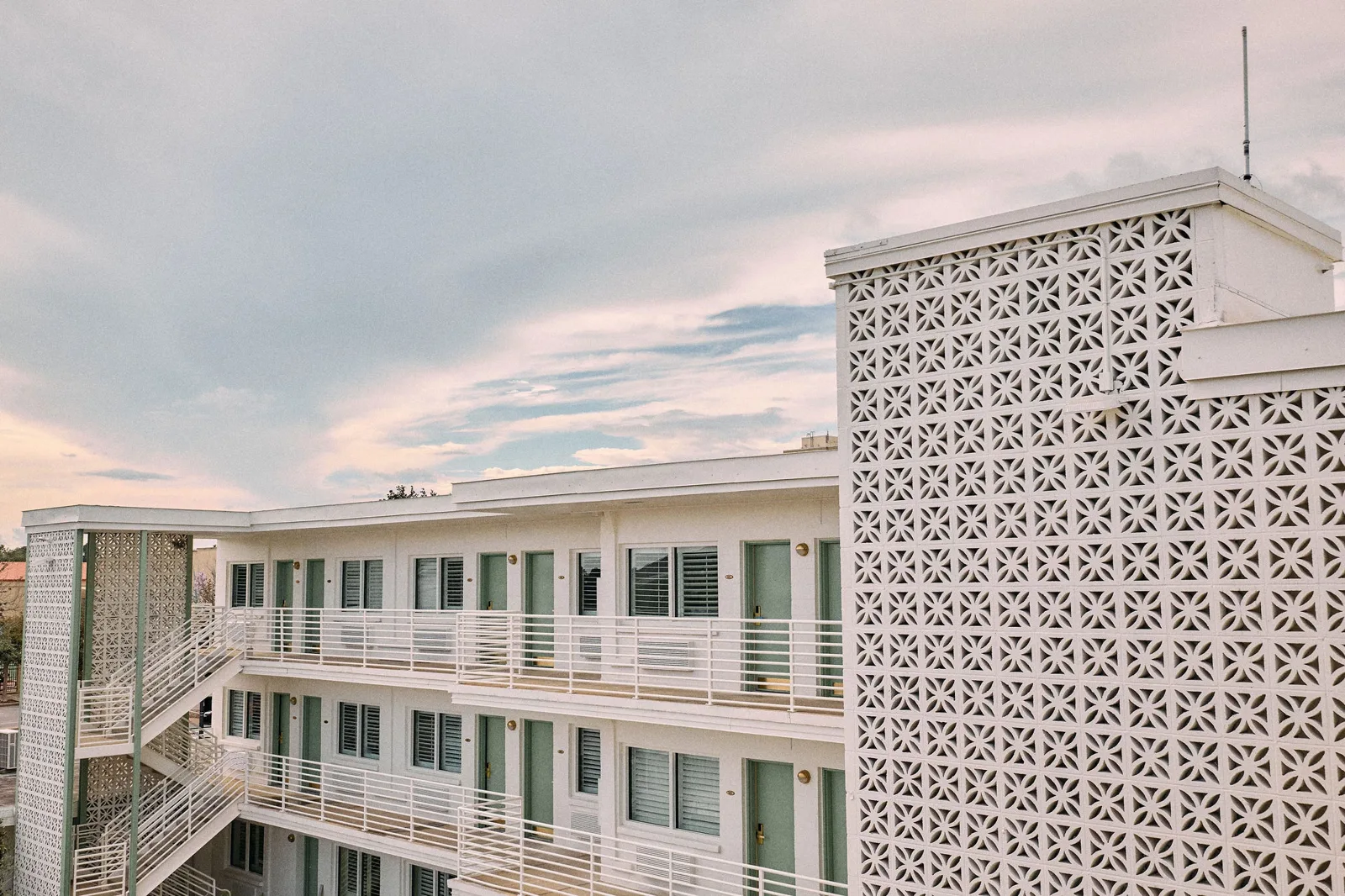 Hotel Margot's three floors of rooms and breeze-block stair tower at 200 N. Palafox St. in downtown Pensacola.