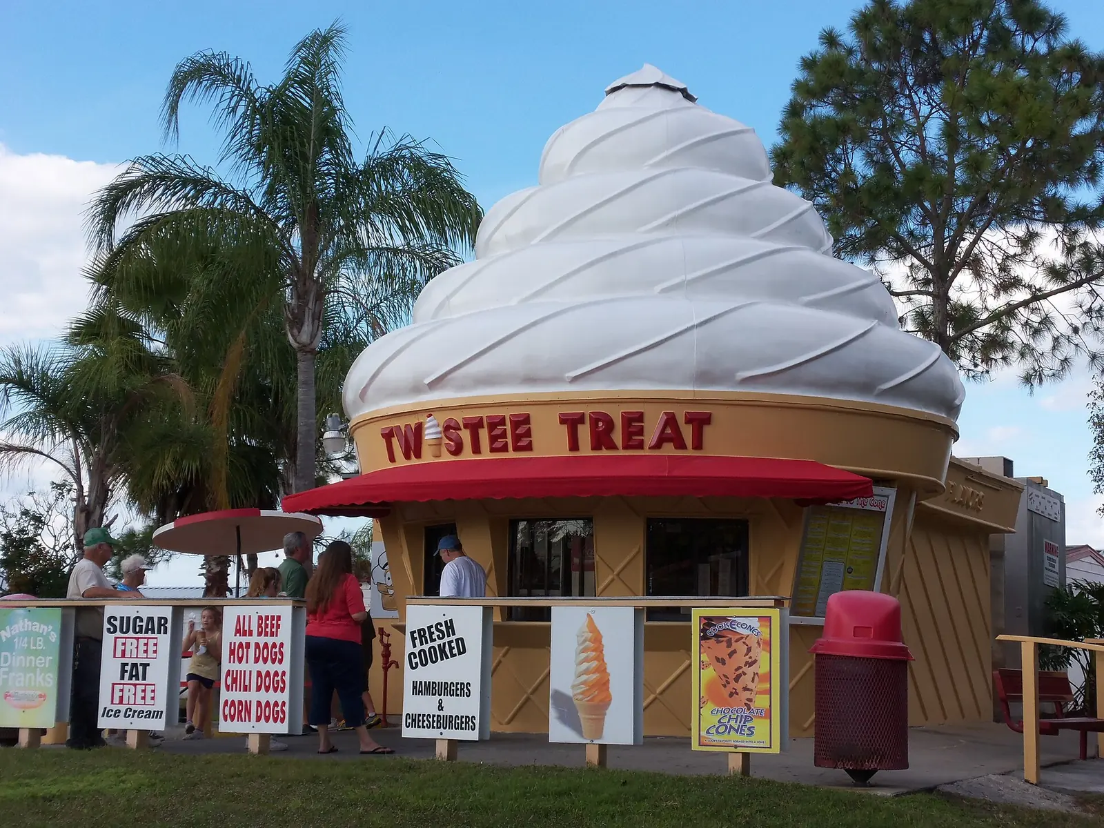 A Twistee Treat ice cream stand shaped like a soft-serve cone in Florida, not one of the places on this list.