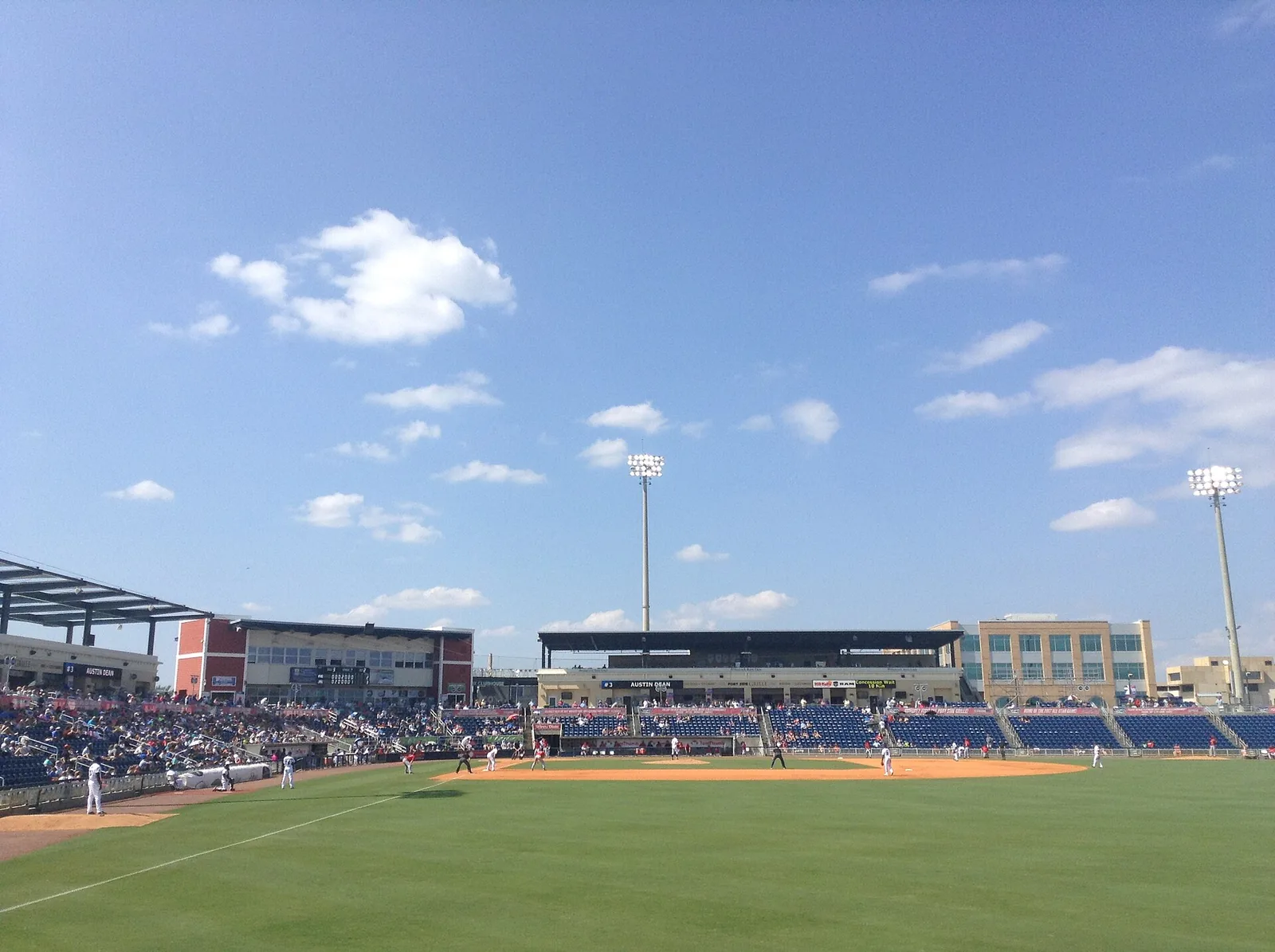 Community Maritime Park on the downtown Pensacola waterfront, with the Blue Wahoos stadium beyond the lawn.