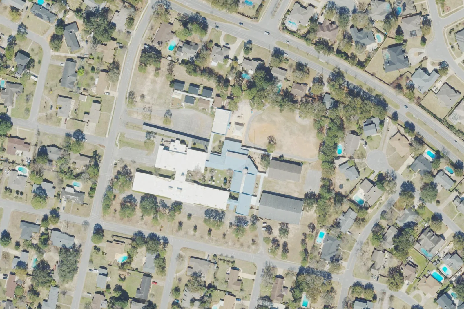 Cordova Park Elementary School's buildings among the houses off Semur Road in Pensacola's Cordova Park neighborhood, seen from the air.