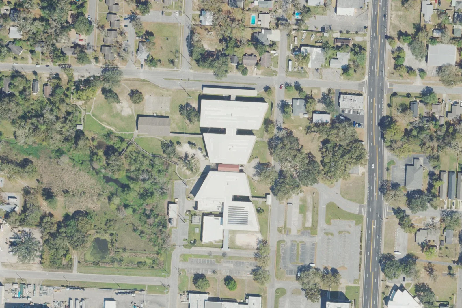 Global Learning Academy's school building on North P Street west of downtown Pensacola, seen from the air.