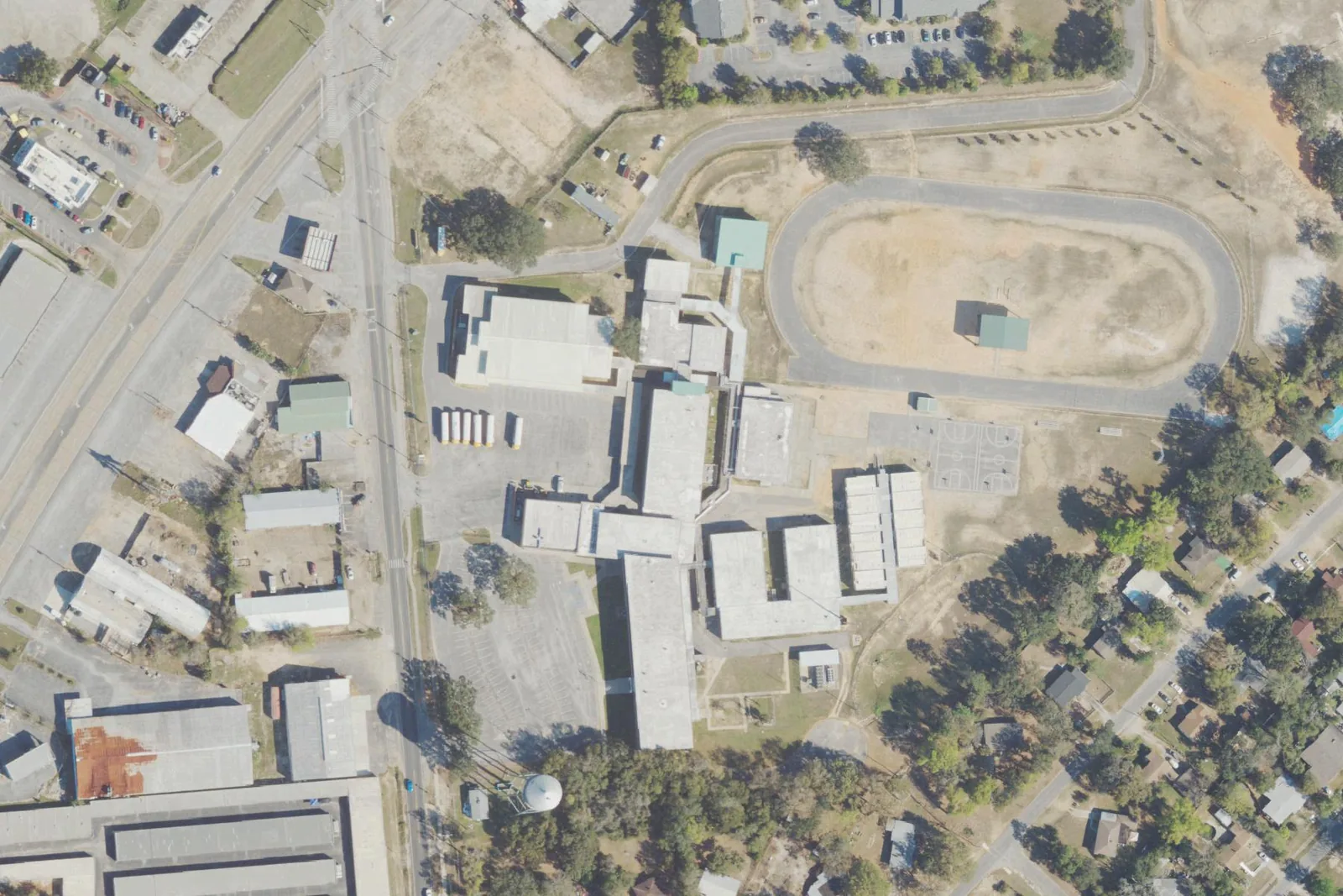 Warrington Preparatory Academy's campus and track off South Old Corry Field Road, west of Pensacola, seen from the air.