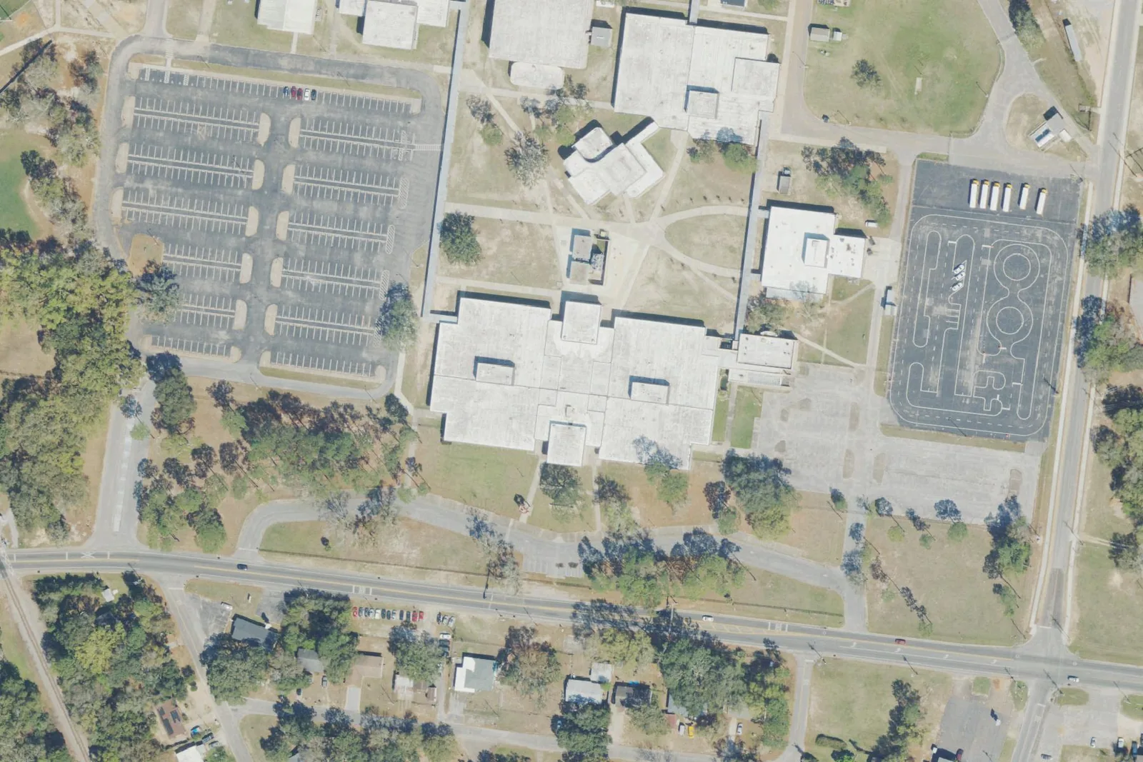 West Florida High School's campus on East Burgess Road north of Pensacola, with its student parking lot at left, seen from the air.
